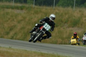 tom on motorcycle.webp